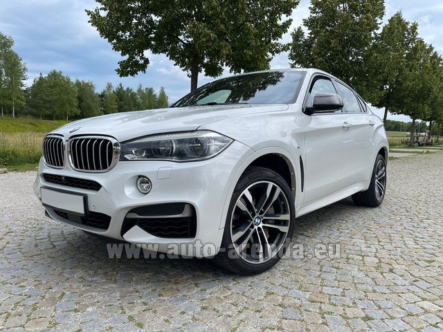 Rental BMW X6 M50d M-SPORT INDIVIDUAL (2019) in Geneva airport